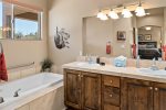 With a separate soaking tub